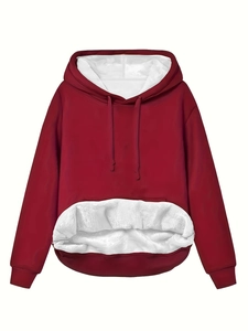 Deep red oversized hoodie with white fleece lining and large front pocket on white background
