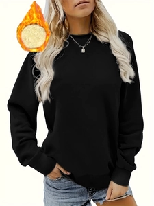 Women's black crewneck fleece sweatshirt with ribbed cuffs for winter casual wear