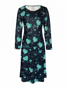 Vestido de mujer con cuello redondo y manga larga con patrones de corazones en negro y turquesa