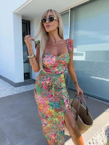 Elegant floral midi dress with side slit and ruffled straps for a summer resort look