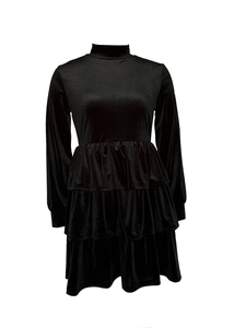 Detail of elegant black tiered dress with high neckline and shimmering velvet texture