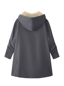 Detail view of the thick dark grey parka with soft beige fleece lining in the hood