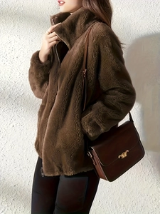 Women's warm dark brown fleece cardigan with high collar and zipper closure for winter