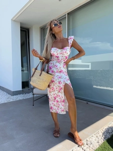 Detail view of floral midi dress with sweetheart neckline and ruffled shoulder straps