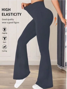Detail showing high elasticity fabric of high-waisted dark grey flare yoga pants