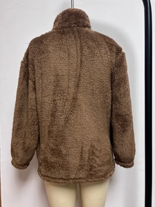 Rear view of a loose dark brown fleece jacket with a high neck and thick texture