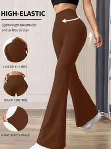 Detail of high waist flared yoga pants showing tummy control and fabric elasticity