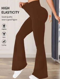 Detail of high-waist flare yoga pants showing tummy control and butt-lifting stretch fabric