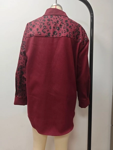 Detail view of burgundy long sleeve shirt with leopard print patchwork on back and sleeve
