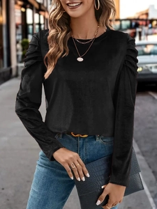 Slim fit black velvet long sleeve top for women with puff sleeves and a round neckline