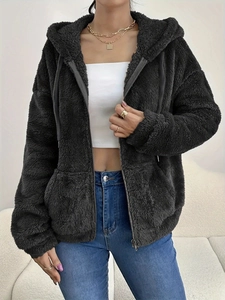 Women's black fleece zip-up hoodie with front pockets in a loose casual fit