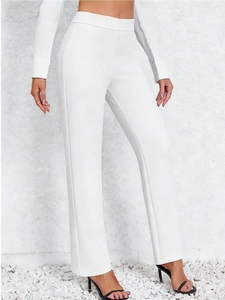 Detailed view of high-waisted white straight-leg trousers with wide waistband and clean cut