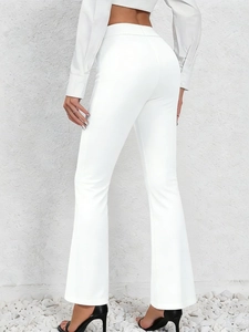 Elegant white high-waist flare pants for women showing a slim fit silhouette and back view