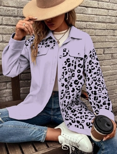 Detail of lavender corduroy jacket with leopard print trim and front chest pockets