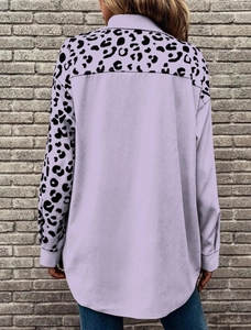 Detail of light purple leopard print contrast paneling on long sleeve shirt back view