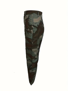Detail view of camouflage cargo pants featuring large side pockets and a classic jungle pattern