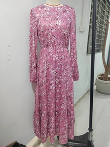 Elegant long sleeve floral maxi dress in dusty pink with elastic high waist and tiered skirt