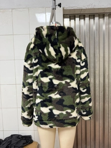 Detail of classic camouflage patterned fleece hoodie showing soft texture and back view