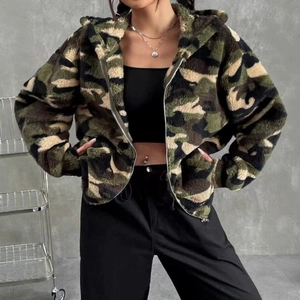 Camo print plush hooded jacket with zipper closure and pockets in a trendy street style