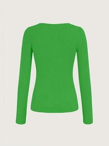 Detailed view of grass green ribbed knit texture on long-sleeve fitted crewneck top