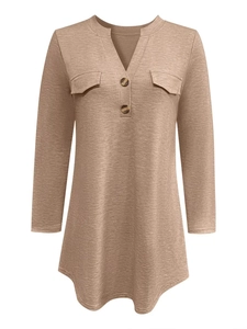 Detail of V-neckline with buttons and flap pocket on camel long sleeve knit tunic