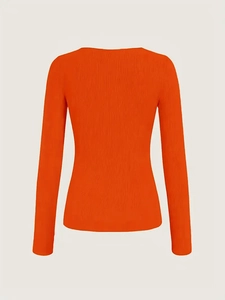 Rear view detail of bright orange slim fit long sleeve knit top with ribbed texture