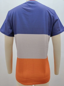 Detail view of the tricolor horizontal patchwork design on a breathable cotton tee