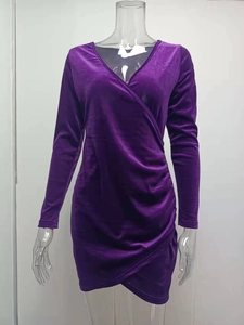Detailed view of the deep purple velvet V-neck dress featuring elegant side gathering