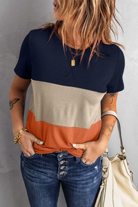 Detail of color-block striped T-shirt with navy, beige and orange panels in natural light