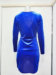 Rear view of royal blue velvet V-neck dress showing slimming fit and glossy texture