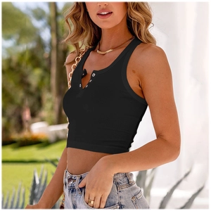 Detail of black ribbed knit crop top featuring silver button henley neck and slim fit style
