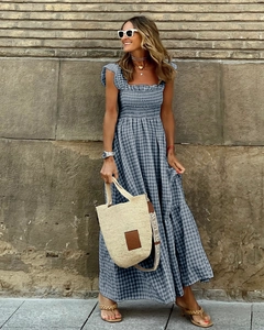 Blue and white gingham smocked maxi dress with ruffled cap sleeves and layered hem