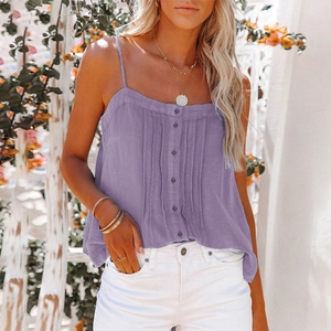 Detail of purple cotton linen camisole with buttons and vertical pleats in outdoor light