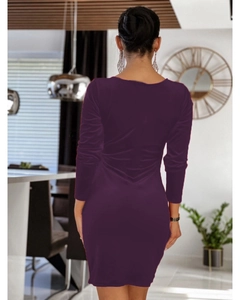 Detail of elegant dark purple velvet dress with slim fit and luxurious texture finish