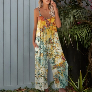 Detail of colorful abstract print jumpsuit with spaghetti straps and side pockets