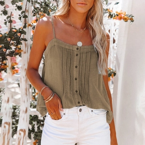 Close-up of summer camisole featuring button front and vertical pleats on khaki fabric