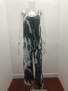 Detail of blue and white tie-dye wide-leg jumpsuit with thin spaghetti straps