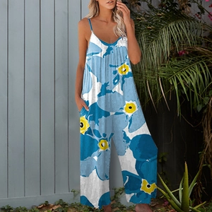 Close-up of blue floral print jumpsuit featuring a wide-leg cut and side pockets