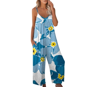 Detail showing high-quality tie-dye floral pattern and practical side pockets on jumpsuit