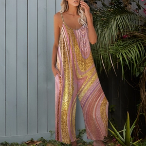 Detail of V-neck jumpsuit featuring marble print fabric and practical side pockets