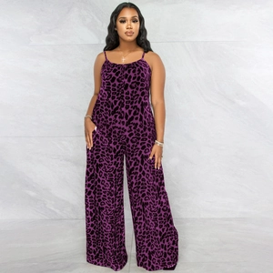 Detail view of purple leopard print jumpsuit featuring spaghetti straps and side pockets
