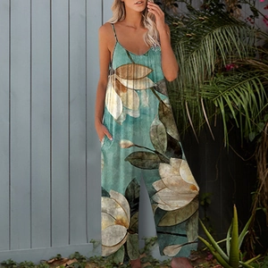 Detailed view of women's green floral wide-leg jumpsuit with v-neck and side pockets