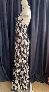 Detail of high waist elastic pleats and white pineapple print on a halter maxi dress