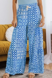 Detail view of elastic drawstring waist on Bohemian floral patchwork lounge pants