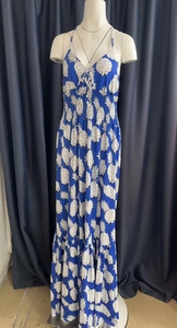 Detail of smocked elastic waist and pineapple print on summer halter maxi dress