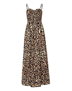 Detailed close-up of smocked bodice and leopard print pattern on summer maxi dress