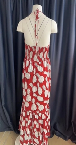 Detail of red pineapple print dress showing the halter tie-back and elastic ruched bodice