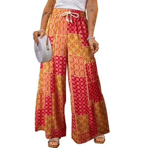 Bohemian floral wide leg pants with colorful patchwork and white drawstring waist