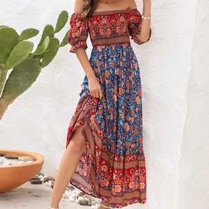 Detail view of Bohemian off-shoulder floral maxi dress with puff sleeves and vibrant prints