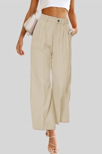 Detail view of high waist wide leg trousers featuring button fly and side pockets in beige